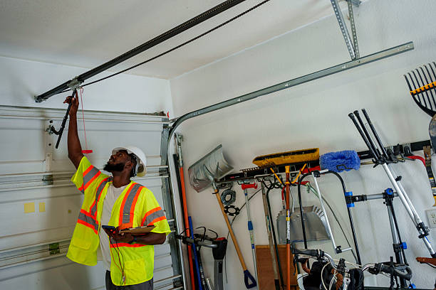 Professional Garage Door Panel Replacement technician working in Sayre, PA